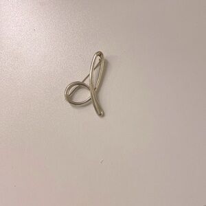 Tiffany & Co. Elsa Peretti sterling silver lower case letter d brooch/pin.